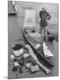 Dr. Hannes Lindemann Standing Next to the Folding Boat He Crossed the Atlantic Ocean In-Peter Stackpole-Mounted Photographic Print