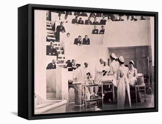 Dr. Harvey Cushing in the Operating Theater with an Audience of Physicians, 1910-null-Framed Stretched Canvas