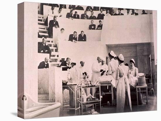 Dr. Harvey Cushing in the Operating Theater with an Audience of Physicians, 1910-null-Stretched Canvas