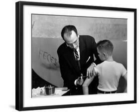 Dr. Jonas Salk Inoculating a Young Boy W. His New Polio Vaccine-null-Framed Premium Photographic Print