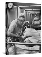 Dr. Michael E. Debakey, Chief Heart Surgeon at the Methodist Hospital-Ralph Morse-Stretched Canvas