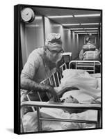 Dr. Michael E. Debakey, Chief Heart Surgeon at the Methodist Hospital-Ralph Morse-Framed Stretched Canvas