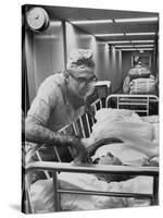 Dr. Michael E. Debakey, Chief Heart Surgeon at the Methodist Hospital-Ralph Morse-Stretched Canvas