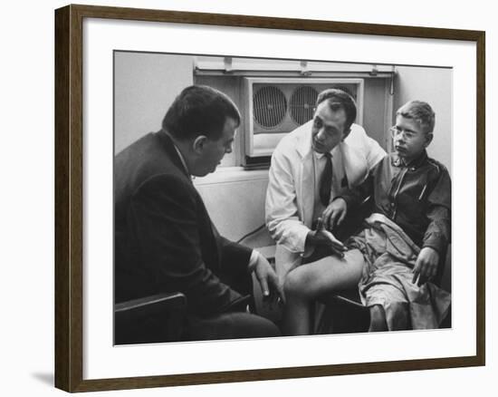 Dr. Richard Varco Talking with Dr. Robert A. Good About Successful Skin Graft on Boy-null-Framed Photographic Print