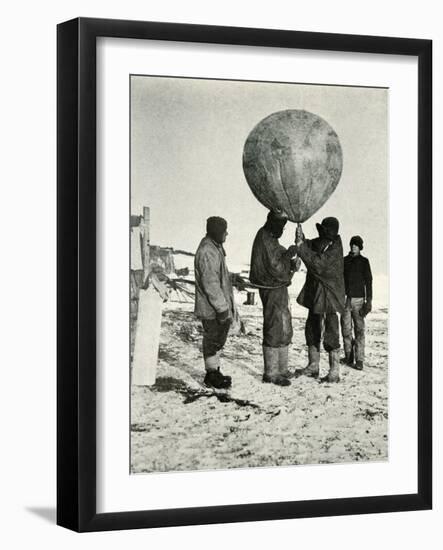 'Dr. Simpson Sending Up a Balloon', 1911, (1913)-Herbert Ponting-Framed Photographic Print