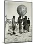 'Dr. Simpson Sending Up a Balloon', 1911, (1913)-Herbert Ponting-Mounted Photographic Print