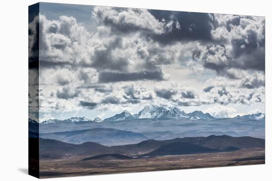 Dramatic Clouds Billow Above a Landscape with the Cordillera Real in the Distance-Alex Saberi-Stretched Canvas