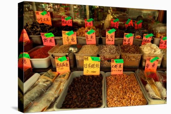 Dried Chinese Herbs, Mushrooms, and Spices in Front of a Grocery-Sabine Jacobs-Stretched Canvas