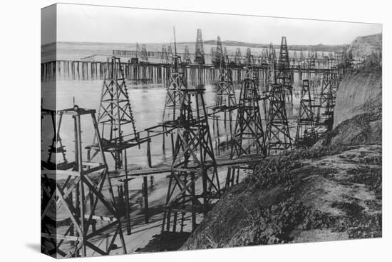 Drilling for Oil Along the Coast of Summerland, California-null-Stretched Canvas