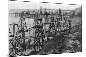 Drilling for Oil Along the Coast of Summerland, California-null-Mounted Photographic Print