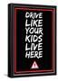 Drive Like Your Kids Live here - Black Street Sign-null-Framed Poster