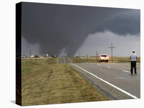 Driver Slows as a Tornado Crosses the Highway in Beaver County, Oklahoma-null-Stretched Canvas