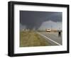 Driver Slows as a Tornado Crosses the Highway in Beaver County, Oklahoma-null-Framed Photographic Print