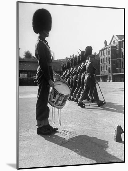 Drummer Beating in Time with Metronome-Cornell Capa-Mounted Photographic Print