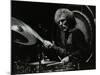 Drummer Ginger Baker Performing at the Forum Theatre, Hatfield, Hertfordshire, 1980-Denis Williams-Mounted Photographic Print