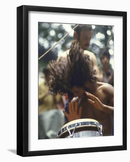 Drummer Playing Instrument with Hands During Woodstock Music Festival-Bill Eppridge-Framed Photographic Print