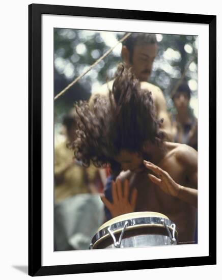 Drummer Playing Instrument with Hands During Woodstock Music Festival-Bill Eppridge-Framed Photographic Print