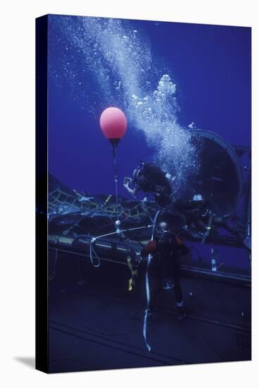 Dry Deck Shelter Operators Retrieve a Combat Rubber Raiding Craft-Stocktrek Images-Stretched Canvas