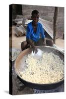 Drying the cassava in the African village of Datcha, Togo-Godong-Stretched Canvas