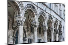 Dubrovnik, Croatia. Ornate columns at Sponza Palace.-Tom Haseltine-Mounted Photographic Print