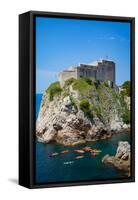 Dubrovnik, Dubrovnik-Neretva County, Croatia. Fort Lovrijenac or St. Lawrence Fortress. Canoeist...-null-Framed Stretched Canvas