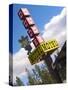 Dude Motel Sign, West Yellowstone, Montana, USA-Nancy & Steve Ross-Stretched Canvas