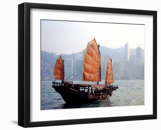 Duk Ling Junk Boat Sails in Victoria Harbor, Hong Kong, China-Russell Gordon-Framed Premium Photographic Print