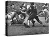 Duke Football Players Tackling the Other Team Players During a Game-null-Stretched Canvas