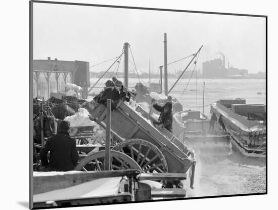 Dumping Snow into the River after a Blizzard, New York-null-Mounted Photo