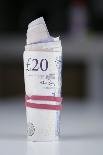 A Roll of Twenty Pound Notes on a Table-Duncan Andison-Laminated Premium Photographic Print