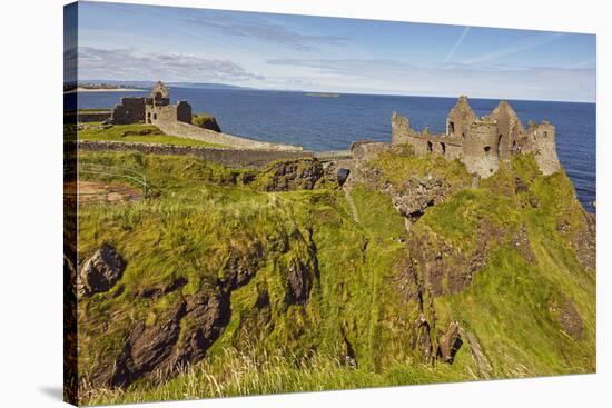 Dunluce Castle, near Portrush, County Antrim, Ulster, Northern Ireland, United Kingdom, Europe-Nigel Hicks-Stretched Canvas
