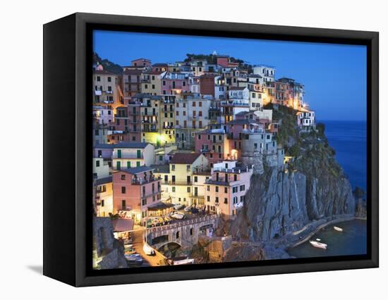 Dusk Falls on a Hillside Town Overlooking the Mediterranean Sea, Manarola, Cinque Terre, Italy-Dennis Flaherty-Framed Stretched Canvas