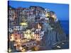 Dusk Falls on a Hillside Town Overlooking the Mediterranean Sea, Manarola, Cinque Terre, Italy-Dennis Flaherty-Stretched Canvas