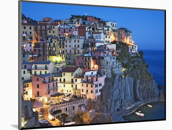 Dusk Falls on a Hillside Town Overlooking the Mediterranean Sea, Manarola, Cinque Terre, Italy-Dennis Flaherty-Mounted Photographic Print