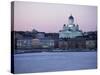 Dusk Light on Lutheran Christian Cathedral in Winter Snow, Across the Frozen Baltic Sea, Finland-Gavin Hellier-Stretched Canvas