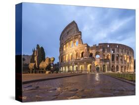 Dusk lights on the Colosseum (Flavian Amphitheatre), UNESCO World Heritage Site, Rome, Lazio, Italy-Roberto Moiola-Stretched Canvas