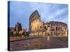 Dusk lights on the Colosseum (Flavian Amphitheatre), UNESCO World Heritage Site, Rome, Lazio, Italy-Roberto Moiola-Stretched Canvas