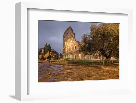 Dusk lights on the Colosseum, the old Flavian Amphitheatre, and symbol of the city, UNESCO World He-Roberto Moiola-Framed Photographic Print