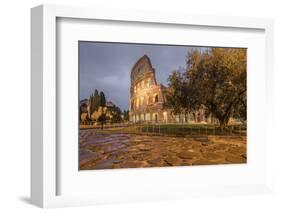 Dusk lights on the Colosseum, the old Flavian Amphitheatre, and symbol of the city, UNESCO World He-Roberto Moiola-Framed Photographic Print