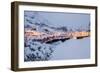 Dusk lights on the fishing village surrounded by snowy peaks, Nusfjord, Northern Norway-Roberto Moiola-Framed Photographic Print