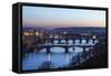 Dusk lights up the historical bridges and buildings reflected on Vltava River, Prague, Czech Republ-Roberto Moiola-Framed Stretched Canvas