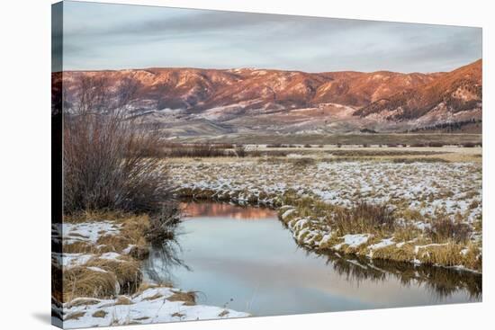 Dusk over Canadian River and Medicine Bow Mountains in North Park near Walden, Colorado, Late Fall-PixelsAway-Stretched Canvas