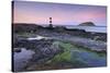 Dusk over Penmon Point Lighthouse and Puffin Island, Isle of Anglesey, Wales, UK. Spring-Adam Burton-Stretched Canvas