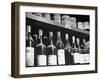 Dust-Covered Wine and Brandy Bottles Standing on Racks in a Wine Cellar-null-Framed Photographic Print