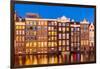 Dutch gables on row of typical Amsterdam houses at night with reflections in the Damrak canal-Neale Clark-Framed Photographic Print