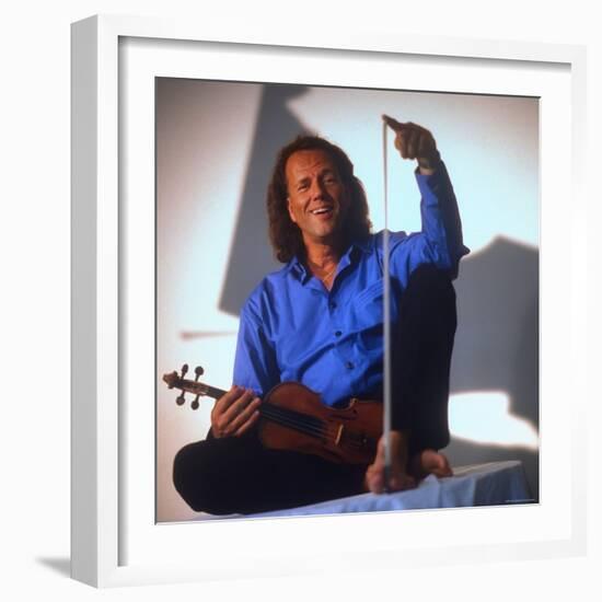 Dutch Violinist Andre Rieu Relaxing, Taking Practice Break with Violin-Ted Thai-Framed Premium Photographic Print