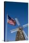 Dutch windmill and US flag, Nelis' Dutch Village, Holland, Michigan.-Randa Bishop-Stretched Canvas