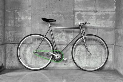 A Fixed-Gear Bicycle (Also Called Fixie) In Black And White With A Green Chain