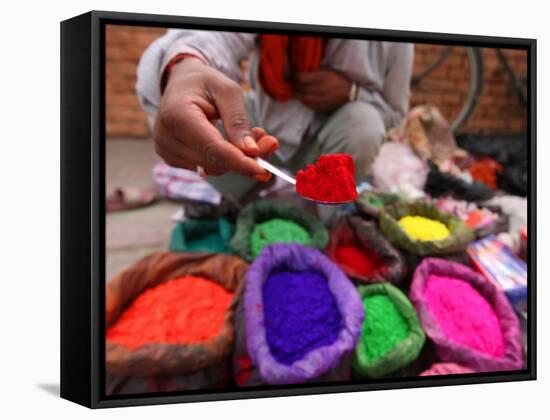 Dye Trader Offers His Brightly Coloured Wares in a Roadside Stall in Kathmandu, Nepal, Asia-David Pickford-Framed Stretched Canvas