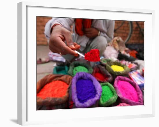 Dye Trader Offers His Brightly Coloured Wares in a Roadside Stall in Kathmandu, Nepal, Asia-David Pickford-Framed Photographic Print